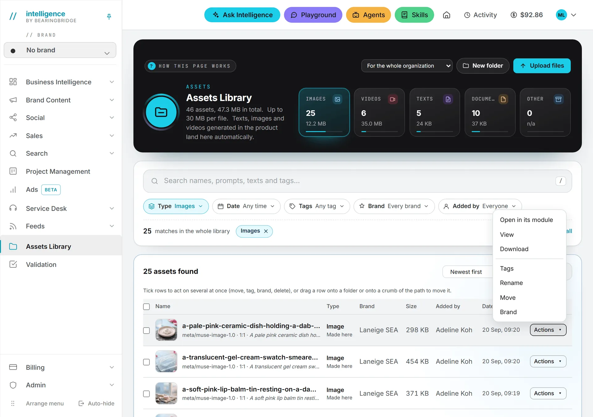 The Actions menu of one asset, open on Open in its module, View, Download, Tags, Rename, Move and Brand